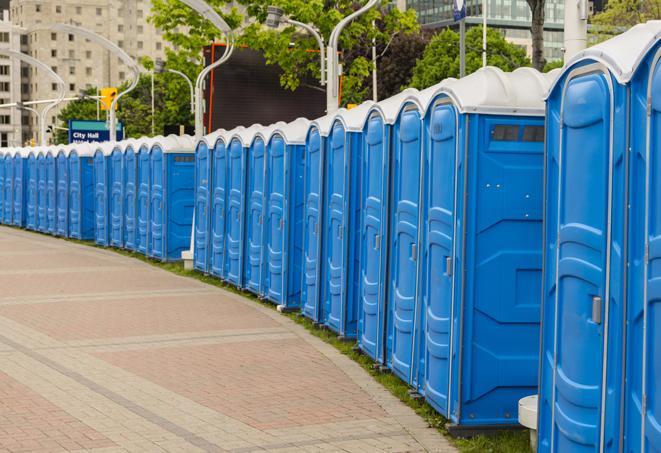 a row of portable restrooms at a fairground, offering visitors a clean and hassle-free experience in altoona